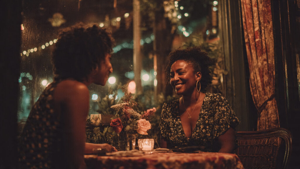 Black women enjoying a sister-friend date night, prioritizing friendship and connection as they age.